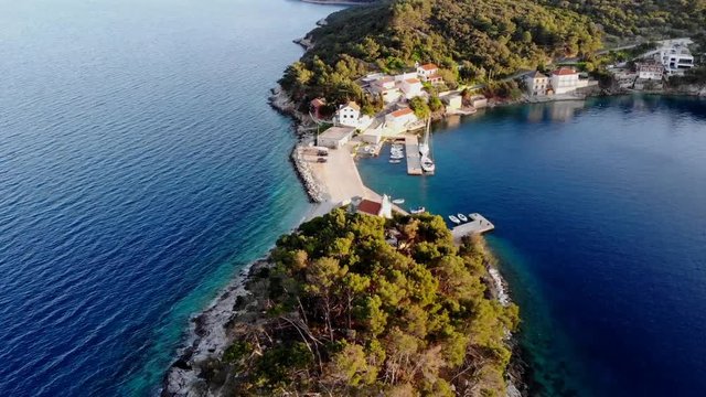 Spectacular footage of flying over picturesque fishing village.