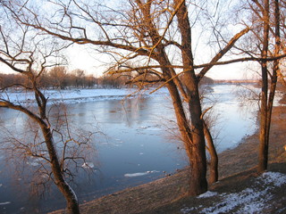 sunset over the river in early spring