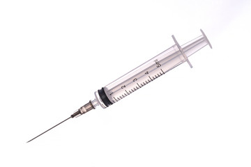 medical syringe with a long needle for the treatment of diseases and beauty shots on a white...