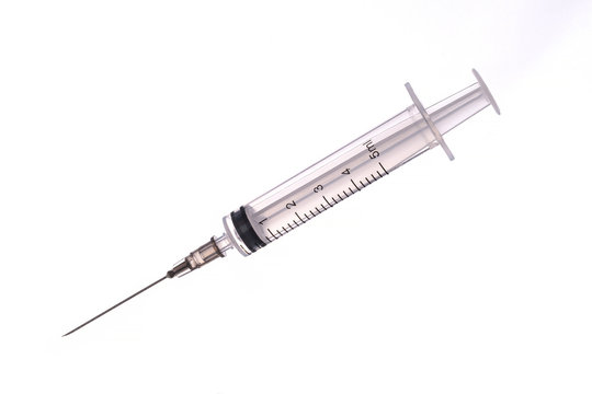 medical syringe with a long needle for the treatment of diseases and beauty shots on a white background