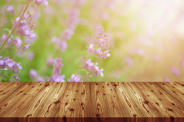 Emtry wooden table on top over blur natural background, can be used mock up for montage products display or design layout.