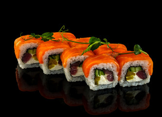 Set sushi roll. Traditional Japanese cuisine. Isolated on black background