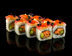 Set sushi roll. Traditional Japanese cuisine. Isolated on black background