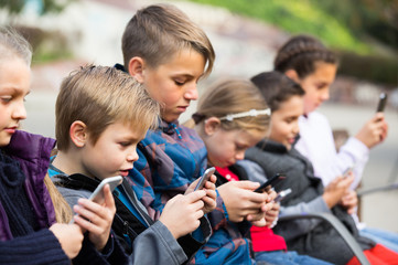 Fototapeta premium children with mobile devices