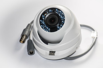 CCTV View of a white dome security camera isolated on white background 
