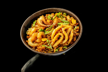 Rice with seafood in oyster sauce.
