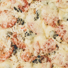 Only from oven the freshly baked and fragrant pizza close-up, flat lay. Square format, matte effect technique