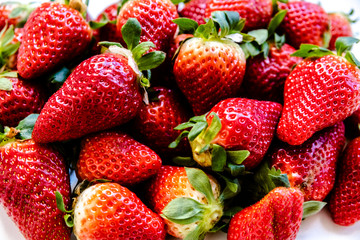 Mediterranean red strawberries shining in a kitchen.