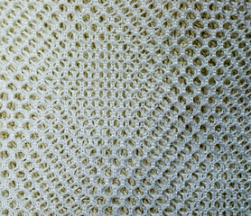 rhombus shape caged textile fabric net. background, texture.