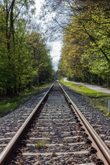 Fototapeta na wymiar Long straight railroad without a train