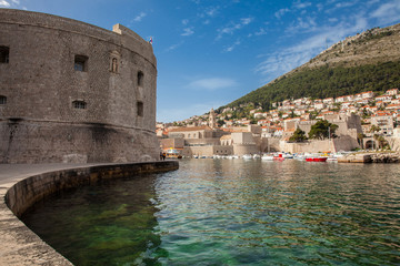 Fototapeta premium Dubrovnik city old port marina and fortifications seen from Porporela