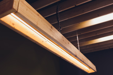 Long decorative lamps in the loft style. Toned.