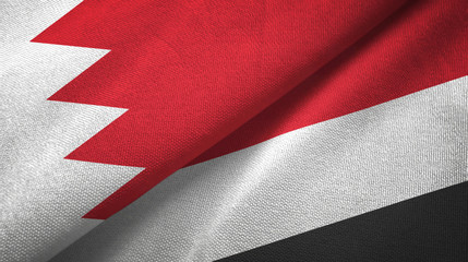 Fototapeta na wymiar Bahrain and Yemen two flags textile cloth, fabric texture