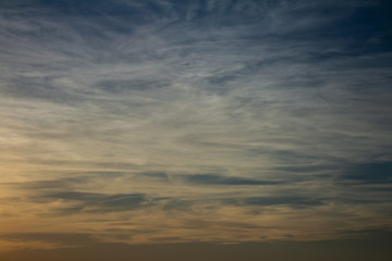 Colorful clouds during sunset in full golden hour.