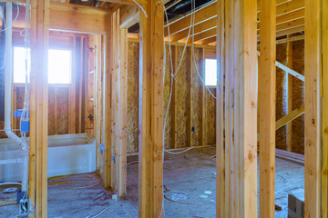 Interior framing beam of new house under construction home framing