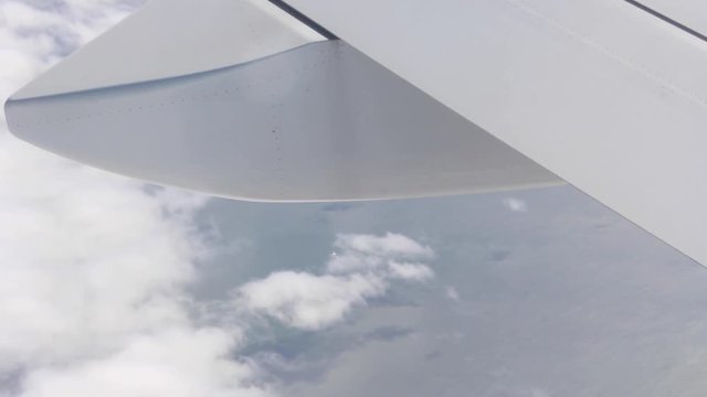 Low altitude plane flying under planes over ocean surface