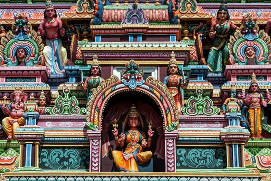 Detail, Hindu temple colourfully decorated with figures and gods, in Rose Belle, Mauritius, Africa