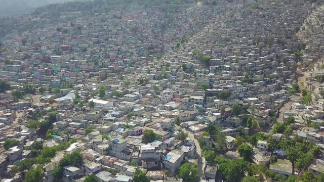 Amazing aerial over the slums, favela and shanty towns in the Cite Soleil district of Port Au Prince, Haiti.
