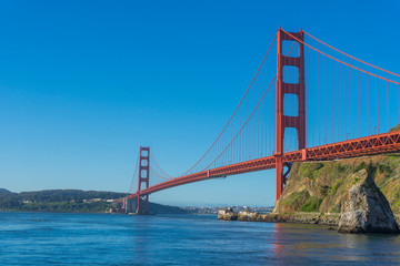 Fototapeta na wymiar Golden Gate Bridge at morning light looking from Horseshoe Bay, San Francisco,USA