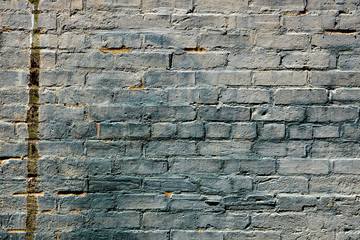 Blue gray painted brick