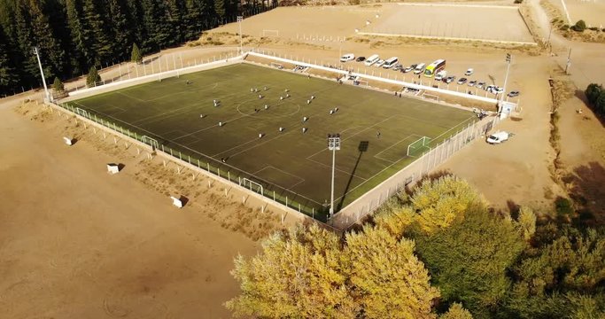 Football soccer in the mountains, patagonia Argentina, filmed with drones