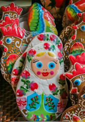 Fototapeta premium Ornate pryaniki, Russian honey spice cookies, shaped like matryoshka dolls at a grocery store in Saint Petersburg Russia