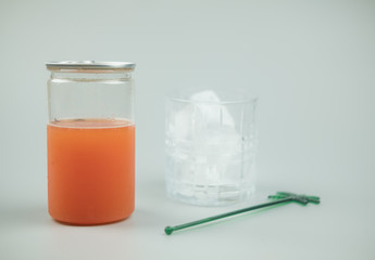 Plastic glass of iced peach soda