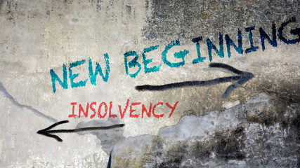 Wall Graffiti to NEW BEGINNING versus INSOLVENCY