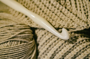 yarn and crochet hook, knitwear,  copy space. 