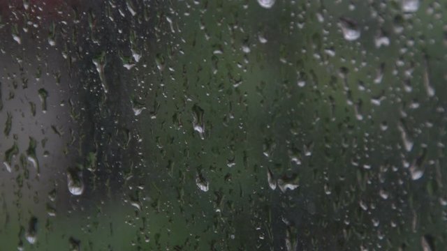 Rain drops on the window during the storm 