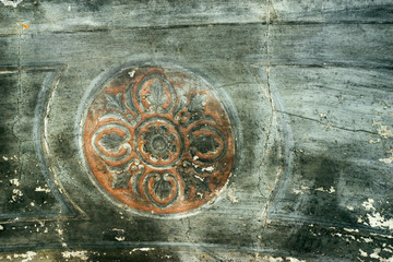 Antique painted rosette ruined temple Cherdin
