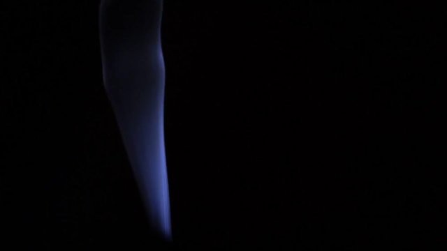 Footage of the flowing blue smoke on the black background. 100 FPS for slow Motion