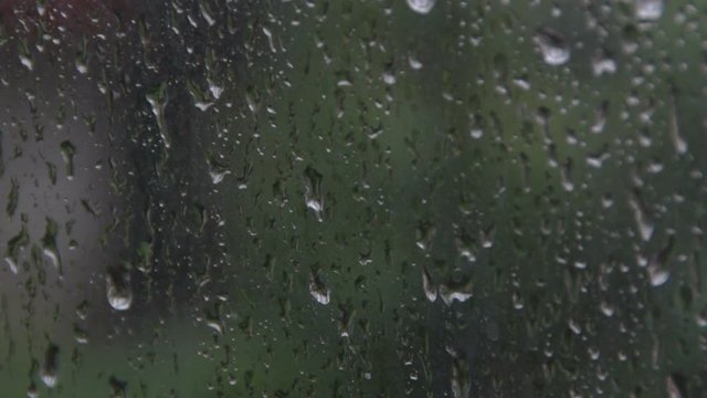 Rain drops on the window during the storm 