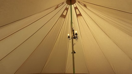 Inside of the bell tent, glamping / camping tent, tilt shot, 4K
