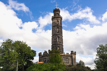 Fototapeta na wymiar EDINBURGH, SCOTLAND - JUN12, 2017: People travel to visit Calton Hill in the center of the capital city and the old town of Edinburgh. It is a view point of Scotland city.