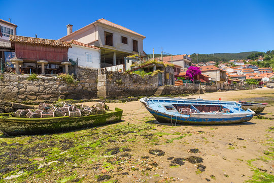 Combarro, Spain. Picturesque landscape with fishing boats and traditional horreo barn