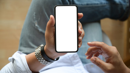 Top view man sitting and holding isolate screen of mobile phone