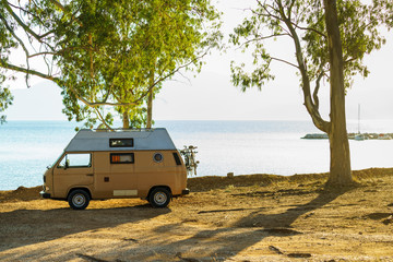 Fototapeta na wymiar Camper car on beach seashore