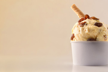 Raisins ice cream cup on table isolated close up