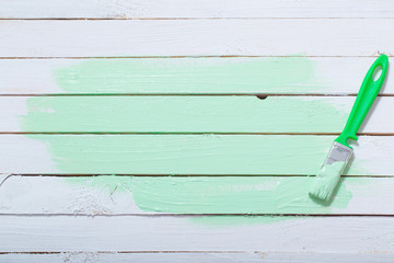 white and green painted wooden background