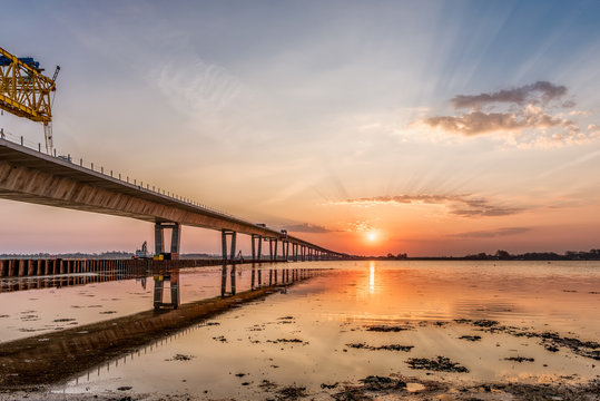 Crown Princess Mary Bridge And A Construcion Crane In The Sunrise