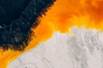 Drone view of contaminated, toxic water stream in Geamana, Romania