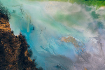 Drone view of contaminated, toxic water stream in Geamana, Romania