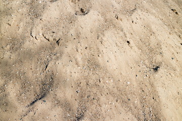 heap of yellow sand close up