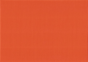 Corrugated colored cardboard orange vintage color. Textural paper cardboard background for design