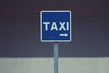 taxi traffic sign on the road in the street in Bilbao city Spain, taxi signal in the city