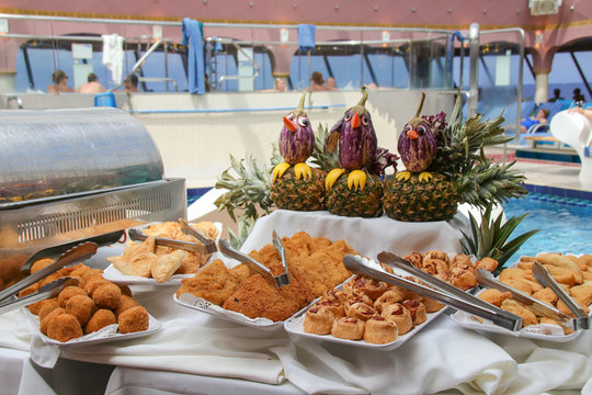 Buffet on the deck of a cruise ship, pool party