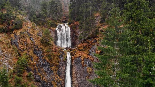 Aerial view of a waterfall in the Zakopane mountains in Poland, beautiful fall scenery.