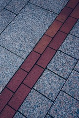 tile in the colorful pavement in the street in Bilbao city Spain,  sidewalk in the street