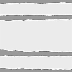 White horizontal torn paper stripes placed on gray background. Vector realistic ripped paper notes.